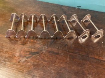 Set van 8 verzilverde messenleggers